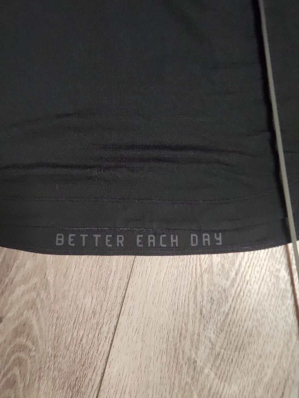 Lululemon Women's Black Crew Neck Short Sleeve High Low Top